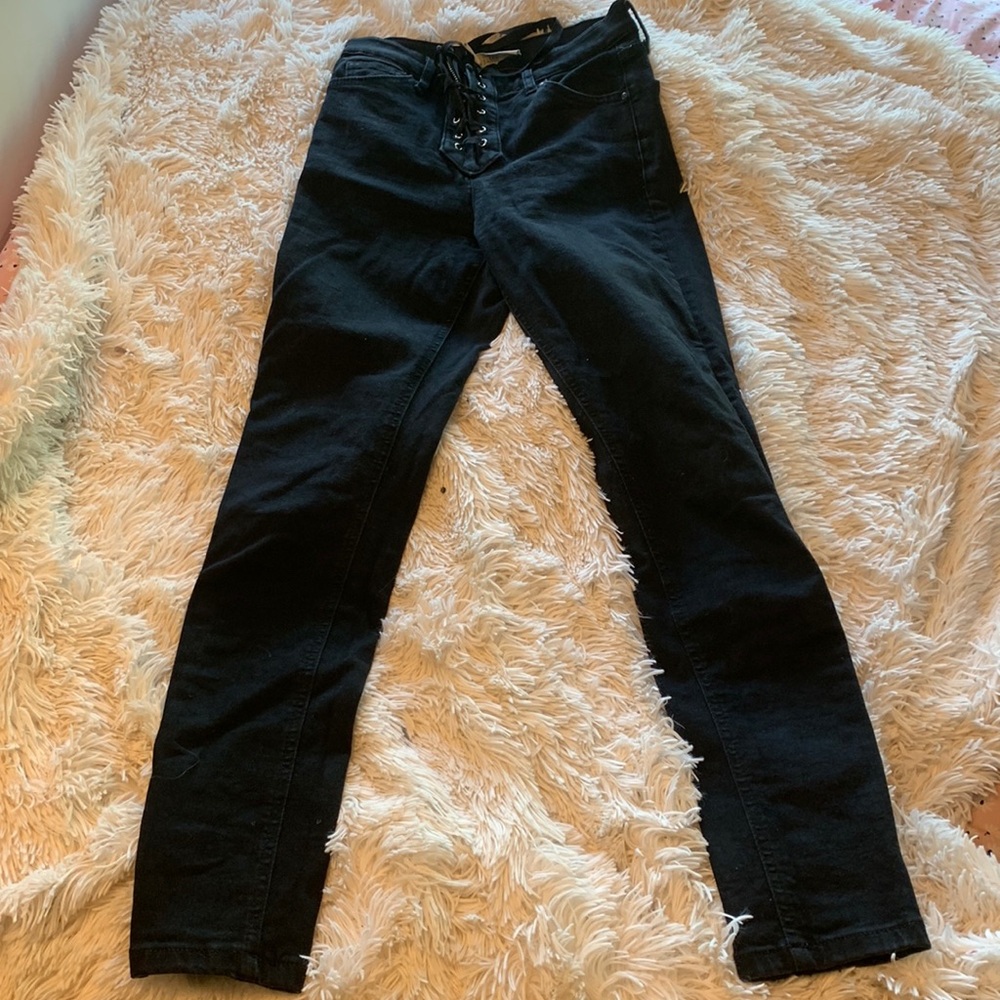 Lace up Topshop skinny jeans